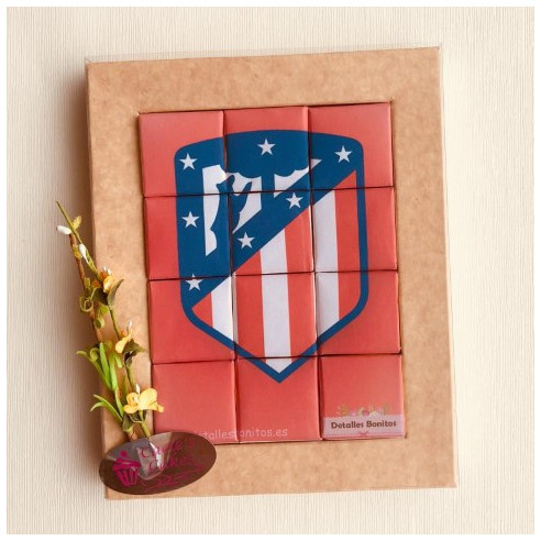 Puzzle de chocolate del escudo del Atlético de Madrid.